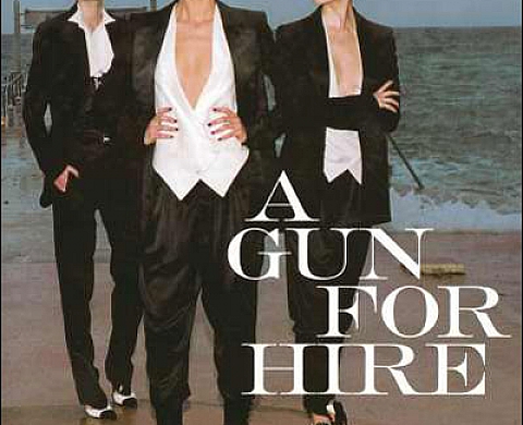 A gun for hire - Helmut Newton A gun for hire - Helmut Newton